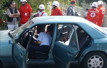 الضحايا في سيارتهم (غسان ريفي) 	