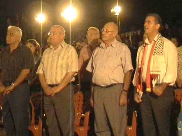 الامين العام للحزب الشيوعي خالد حداده والزميل ياسين وفاعليات في احتفال حولا