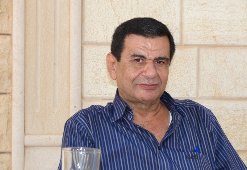 الكاتب محسن محمد علي خريس