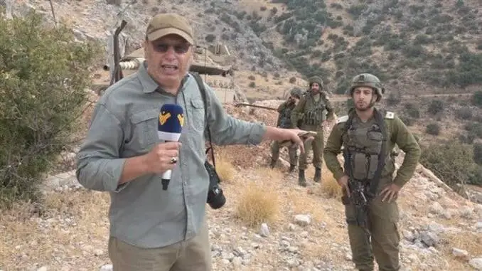 المراسل علي شعيب متحدياً جيش العدو